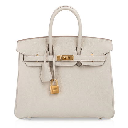 Soft Pale Concrete Neutral Gentle Pebbled Grain Compact Structured Hand Tote With Vibrant Pink Inner Lining, Brushed Golden Twist Lock Hardware And Matching Neutral Suspended Metal Padlock Charm