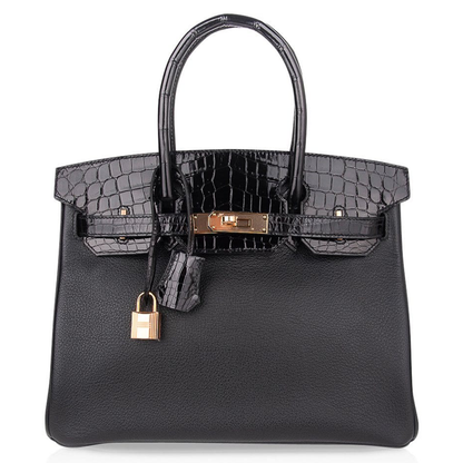 Sleek All-Black Dual Finish Compact Structured Hand Tote With Glossy Scaled Trim, Blush Rose Gold Twist Lock Hardware And Matching Scaled Suspended Metal Padlock Charm