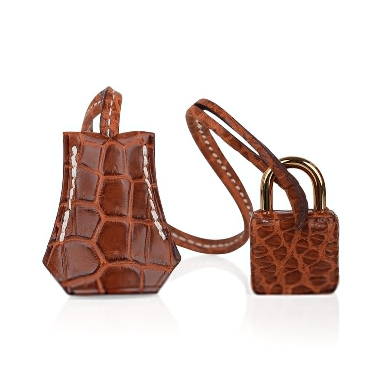 Warm Tawny Amber Brown Distinct Large Scaled Generous Sized Structured Hand Tote With Pale Contrast Edge Stitching, Luminous Golden Twist Lock Hardware And Matching Scaled Suspended Metal Padlock Charm
